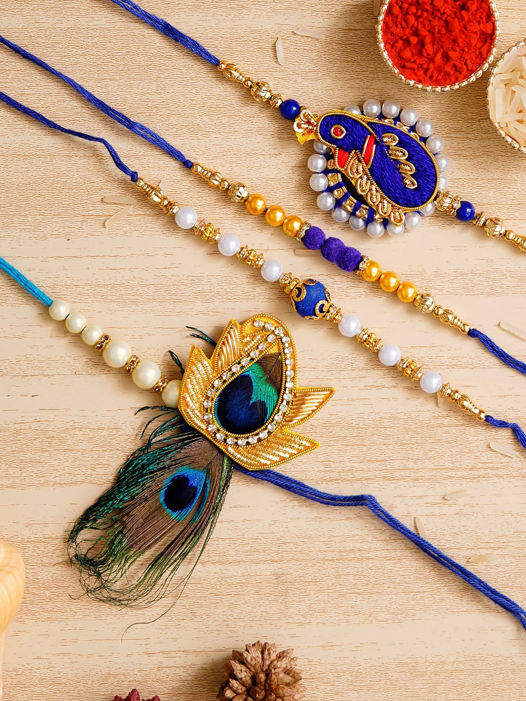 

eCraftIndia Set of 4 Blue Rakhi with Roli Chawal