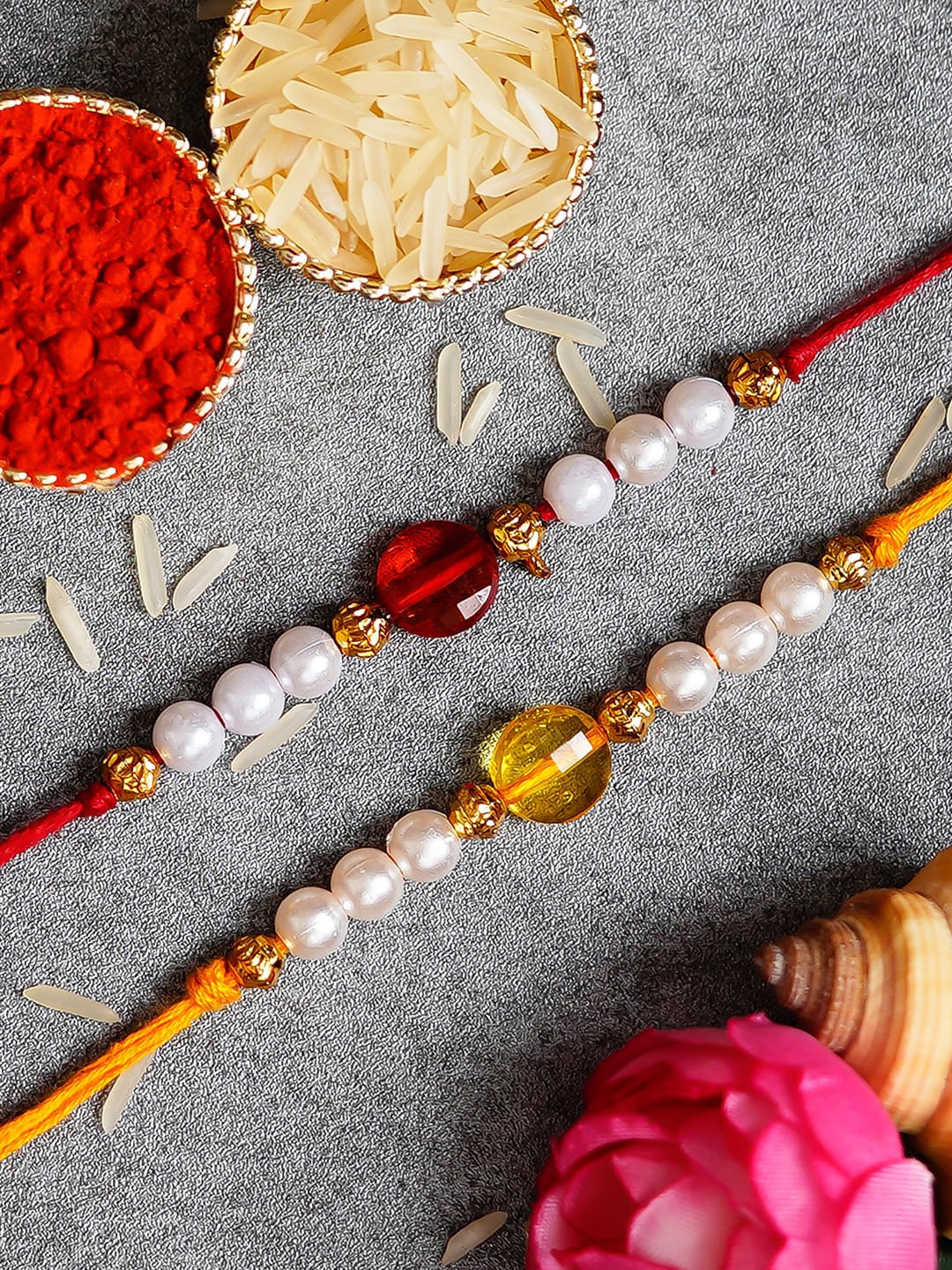 

eCraftIndia Pack of 2 Rakhis and Roli Chawal Pack, Multi