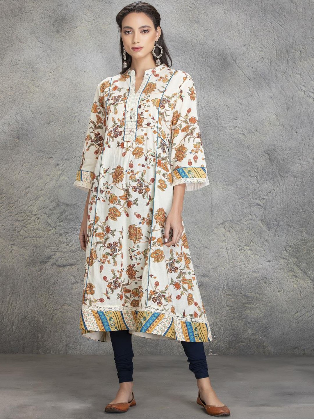 

Lakshita Women Yellow Printed Mirror Work Kurta