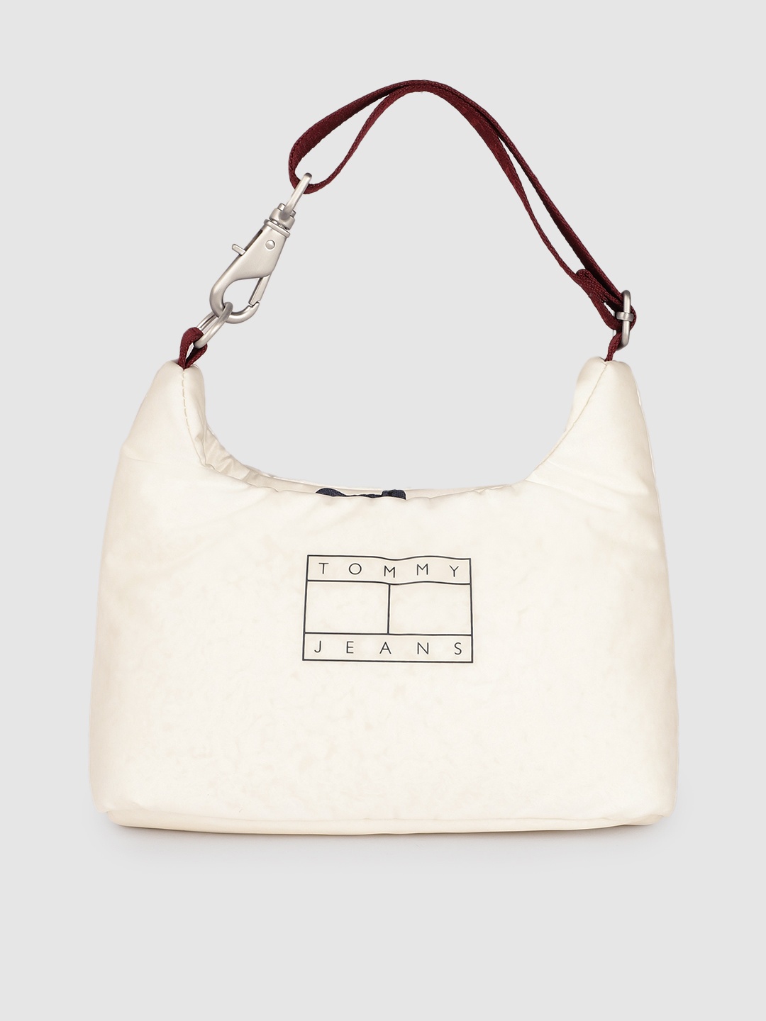 

Tommy Hilfiger Off White HERITAGE PILLOW Brand Logo Print Handheld Bag