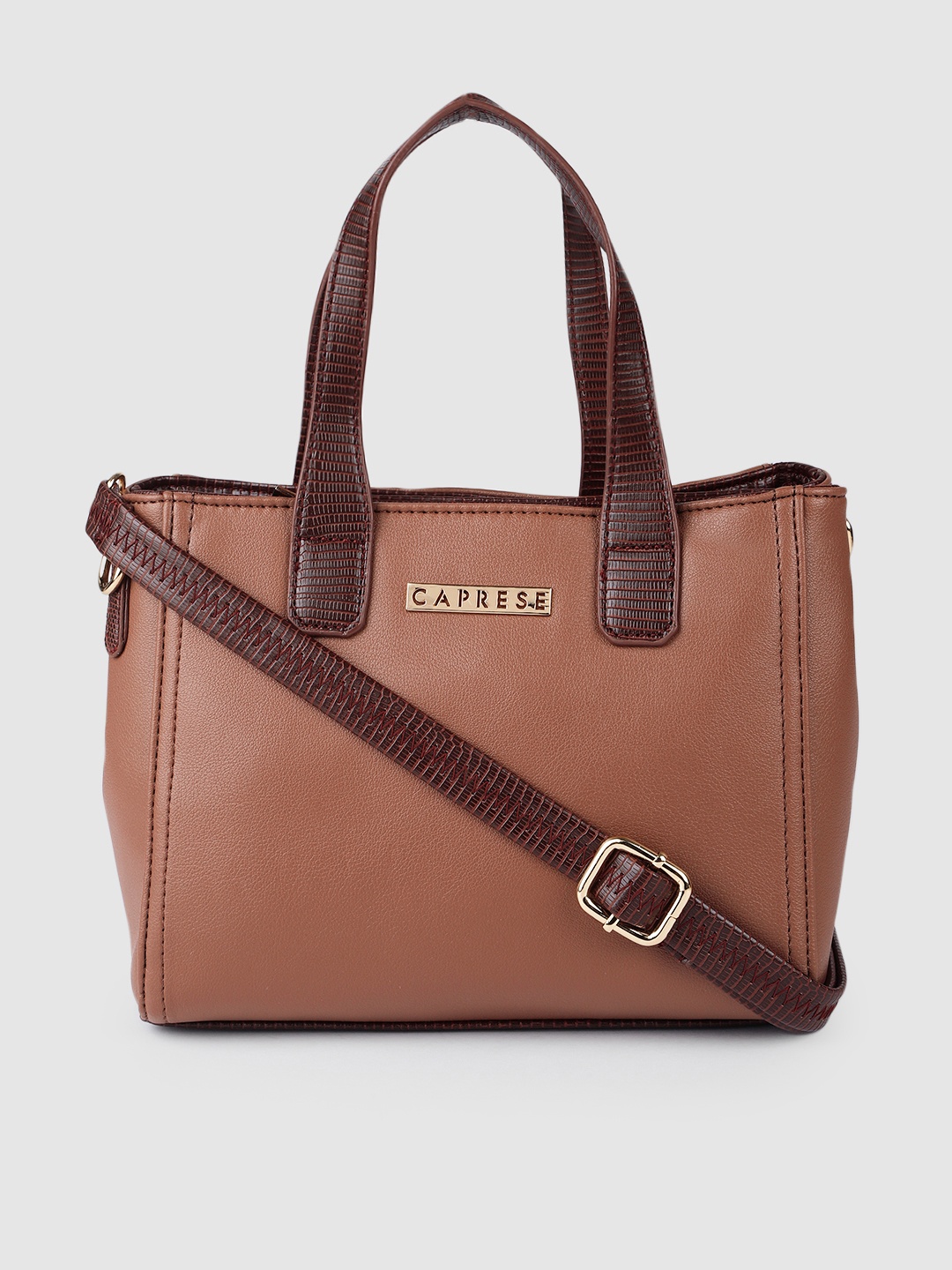 

Caprese Mauve Solid Structured Handheld Bag