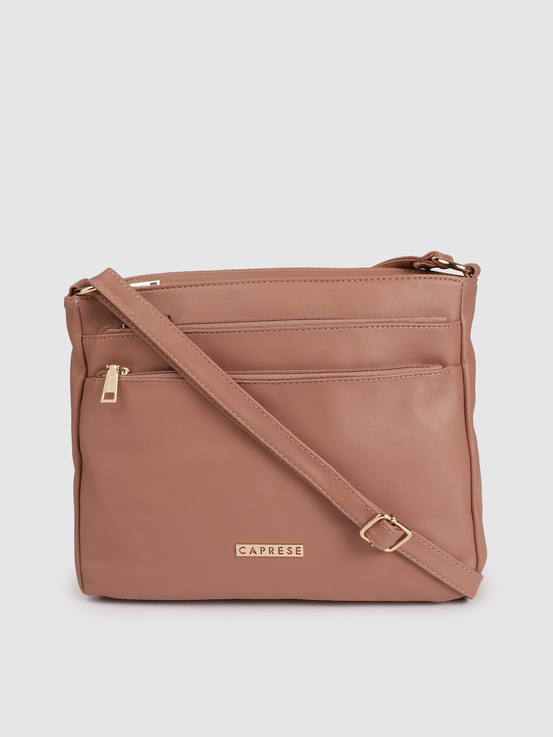 

Caprese Nude-Coloured Solid Regular Structured Crossbody Sling Bag