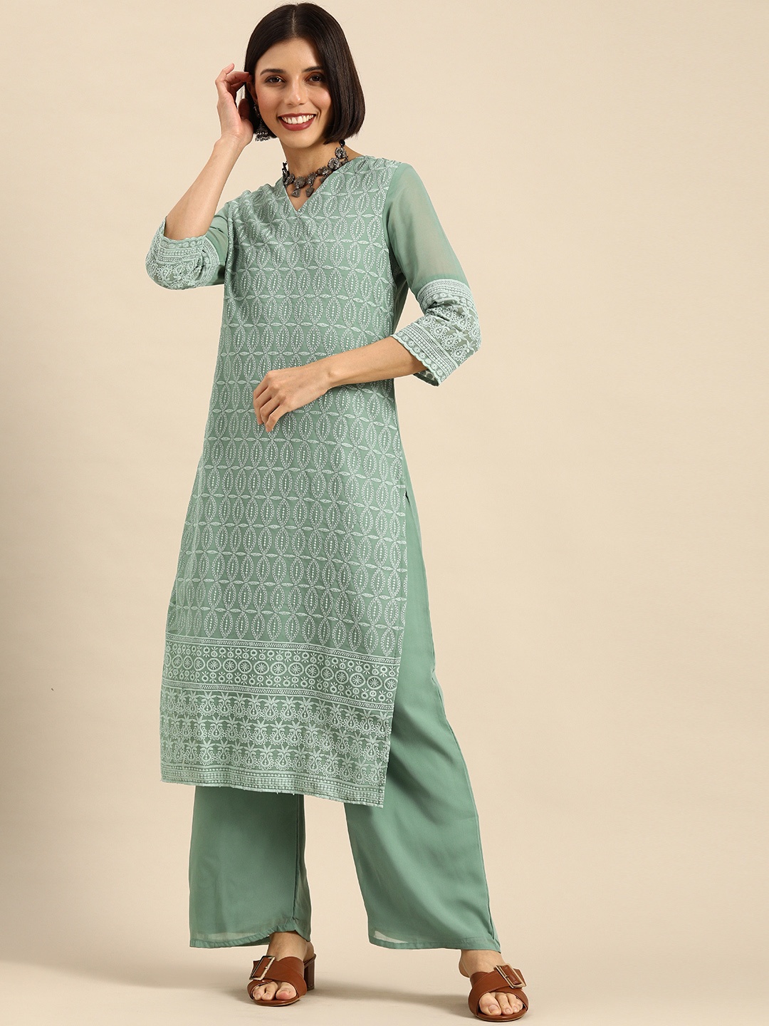 

Anouk Women Turquoise Blue Ethnic Motifs Embroidered Kurta with Palazzos