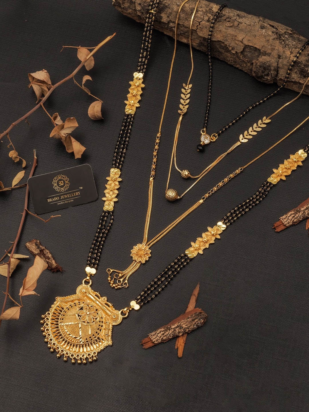 

Brado Jewellery Set Of 4 Gold-Plated Black Beaded Mangalsutra With Jhumka