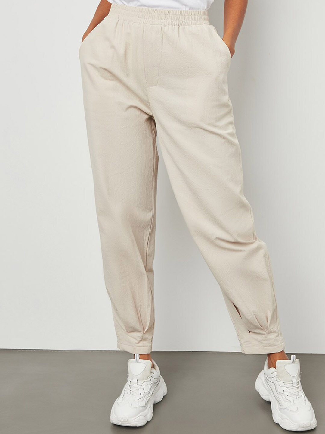 

Styli Women Beige Relaxed Fit Cuffed Jogger Style Pant