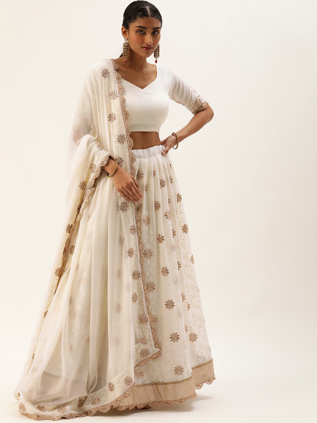 

LOOKNBOOK ART Off White Semi-Stitched Lehenga & Unstitched Blouse With Dupatta