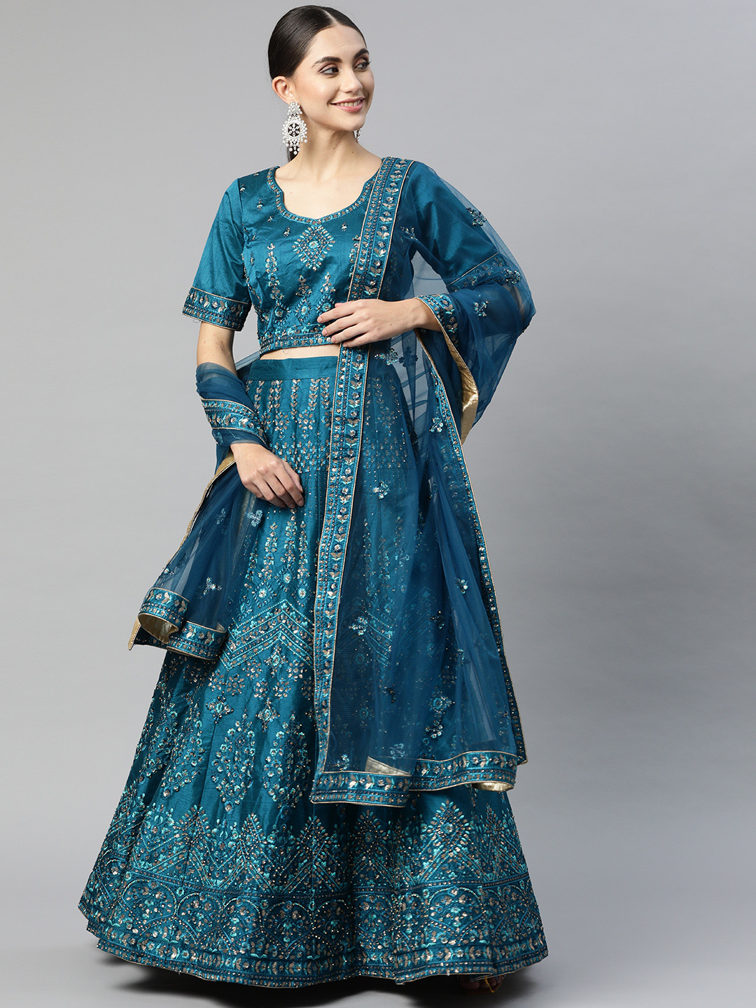 

Readiprint Fashions Teal Blue Embroidered Semi-Stitched Lehenga Choli