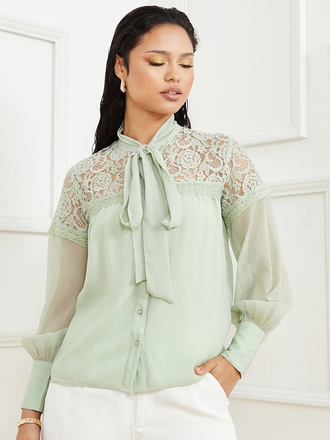 

Styli Green Tie-Up Neck Top