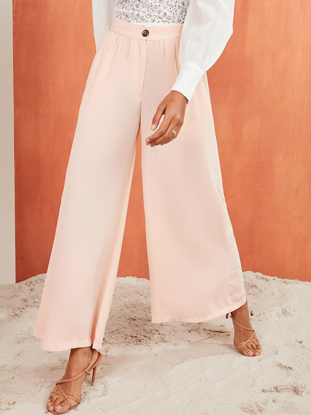 

Styli Women Pink Flared High-Rise Trousers