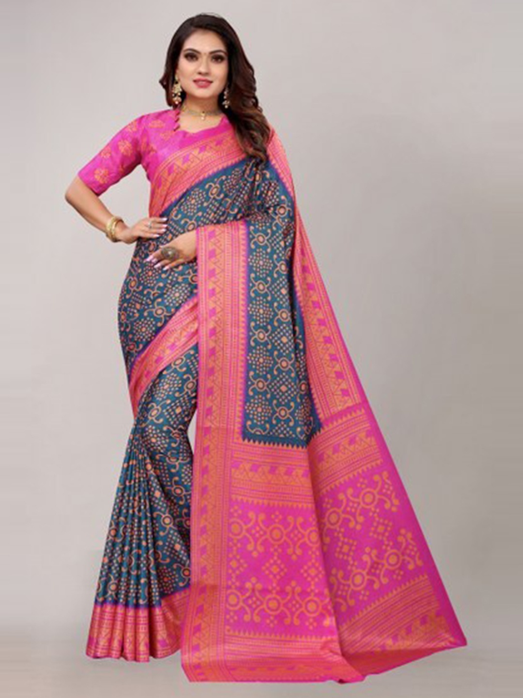 

Yashika Teal & Pink Bandhani Silk Blend Saree