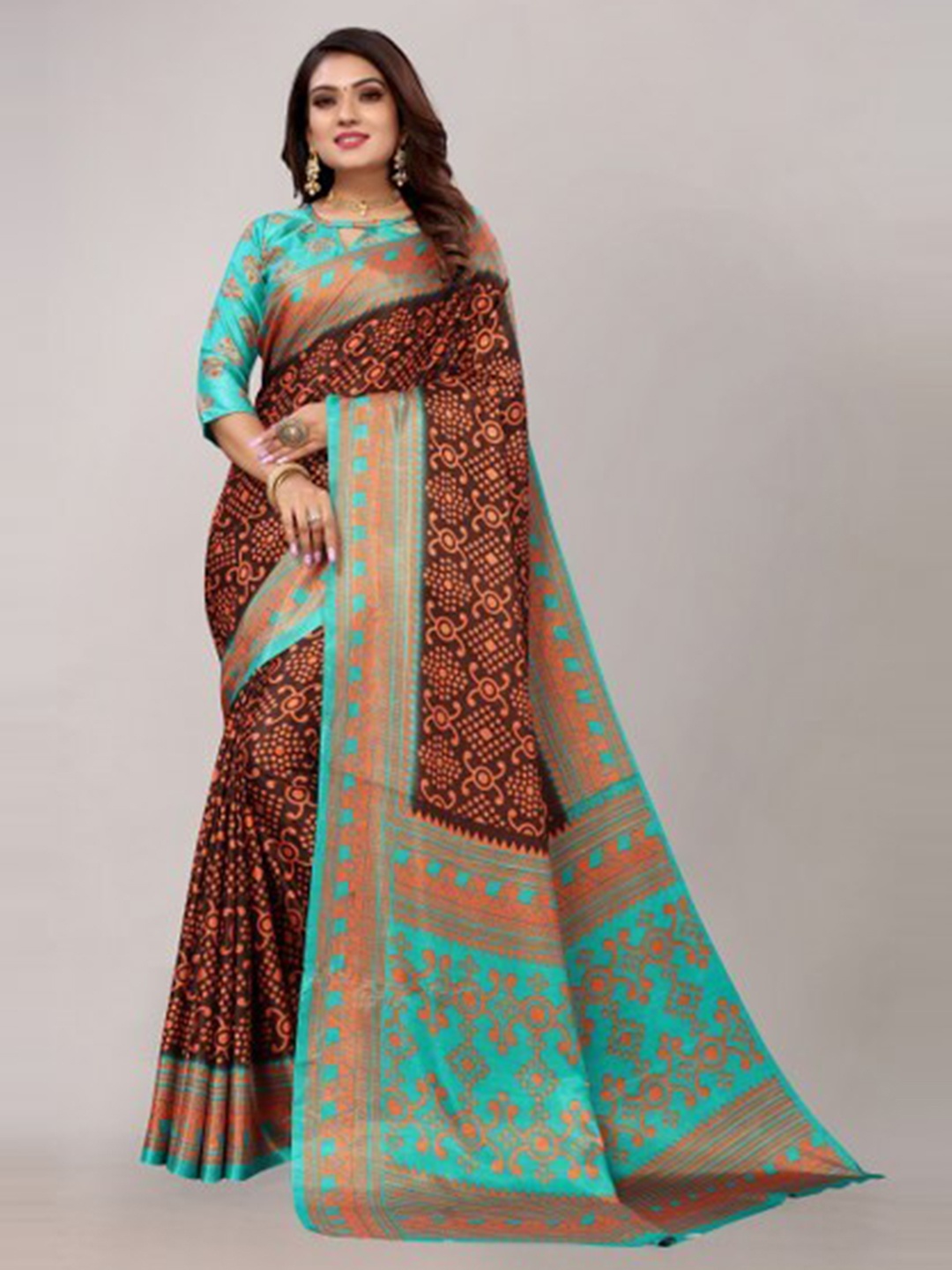 

Yashika Brown & Green Floral Silk Blend Saree