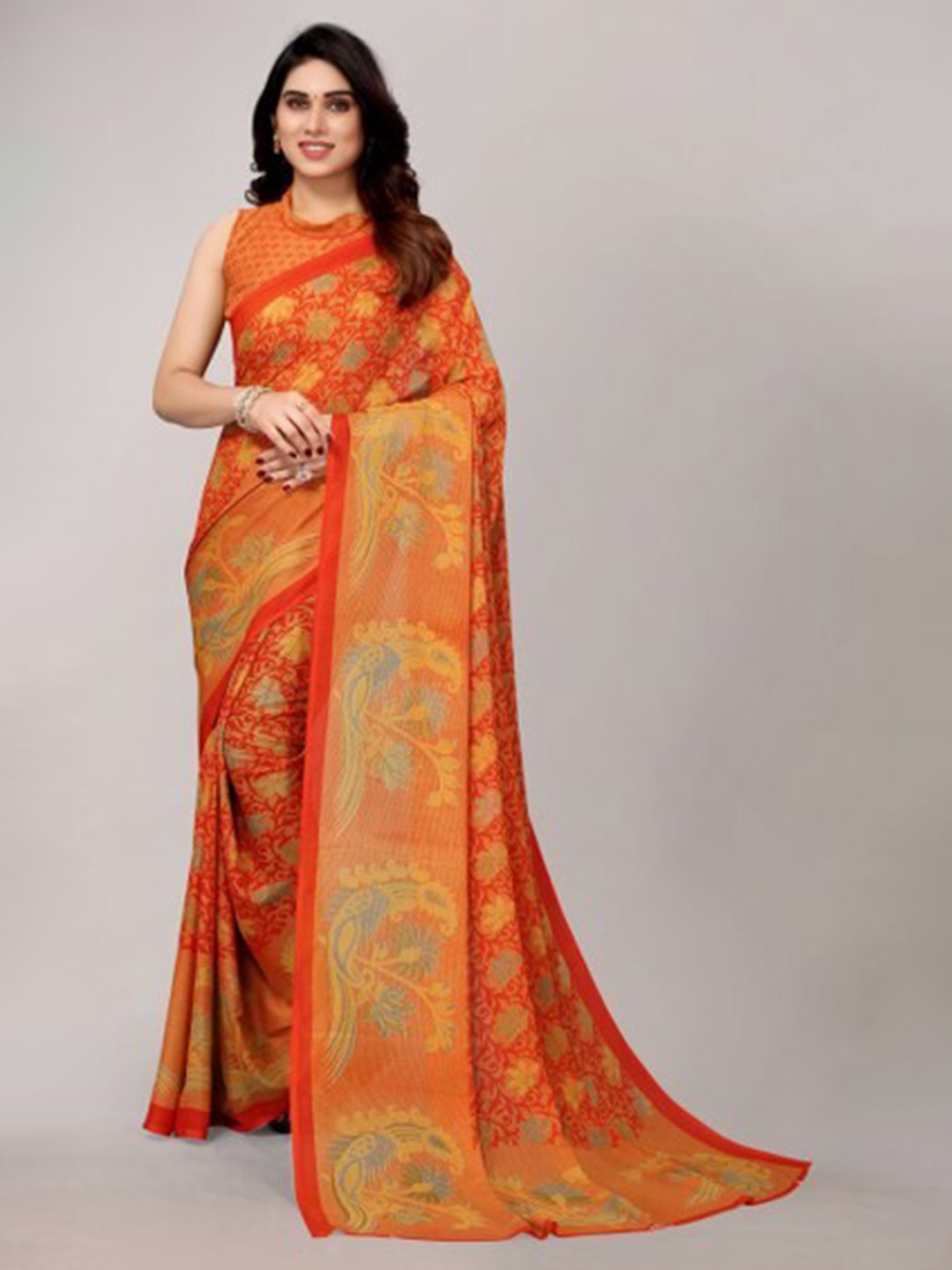 

Yashika Orange & Gold-Toned Floral Saree