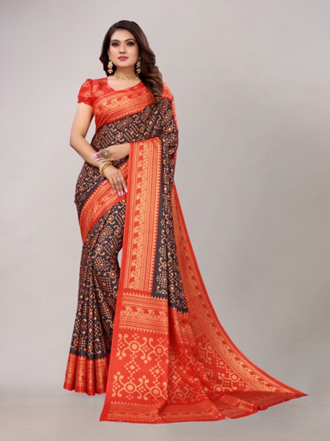 

Yashika Black & Red Ethnic Motifs Zari Silk Blend Saree