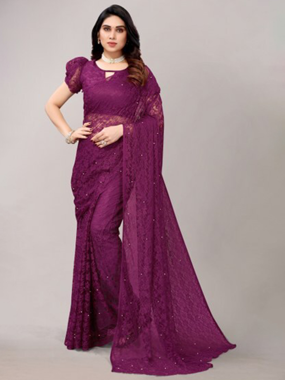 

Yashika Purple Embellished Net Saree