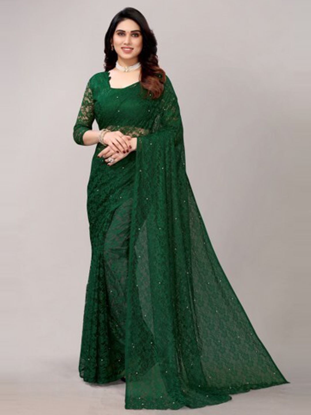 

Yashika Green & Silver-Toned Embellished Beads and Stones Net Saree