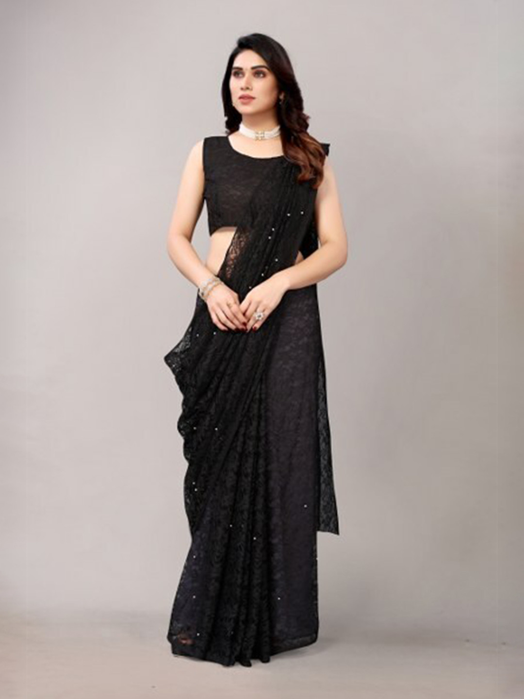 

Yashika Black Floral Embroidered Net Saree