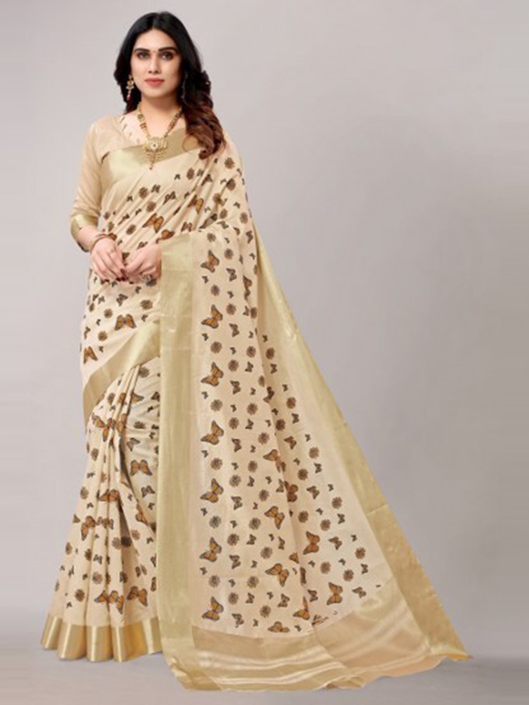 

Yashika Cream-Coloured & Yellow Ethnic Motifs Saree