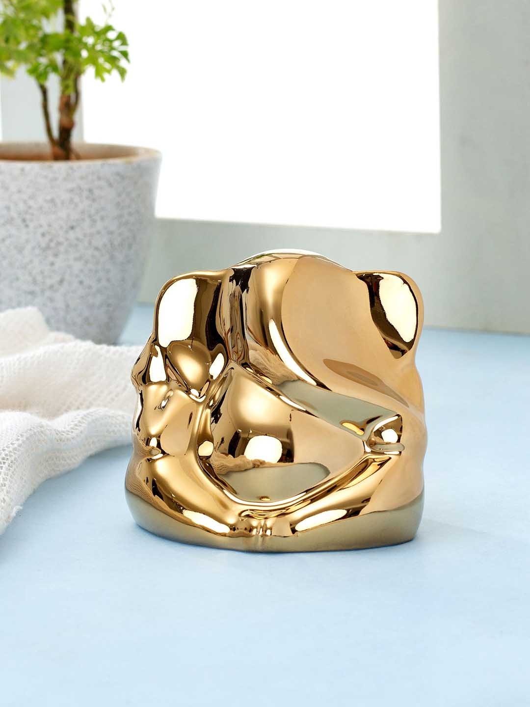 

CLAY CRAFT Gold-Toned Mini Ganesha Showpiece