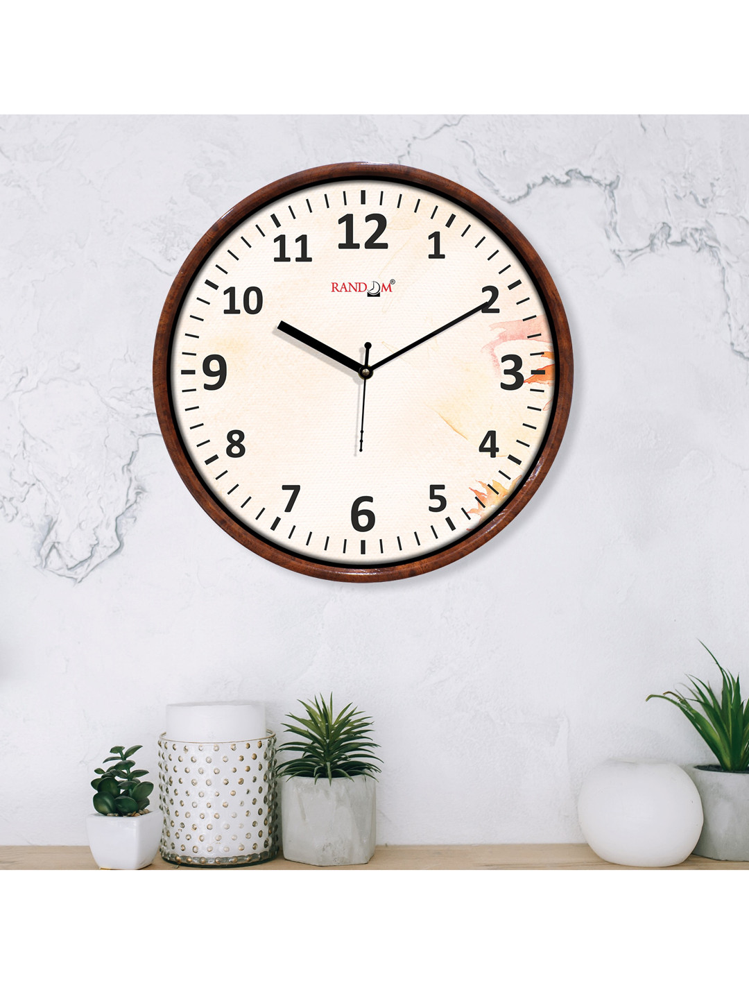 

RANDOM Unisex Peach Clocks