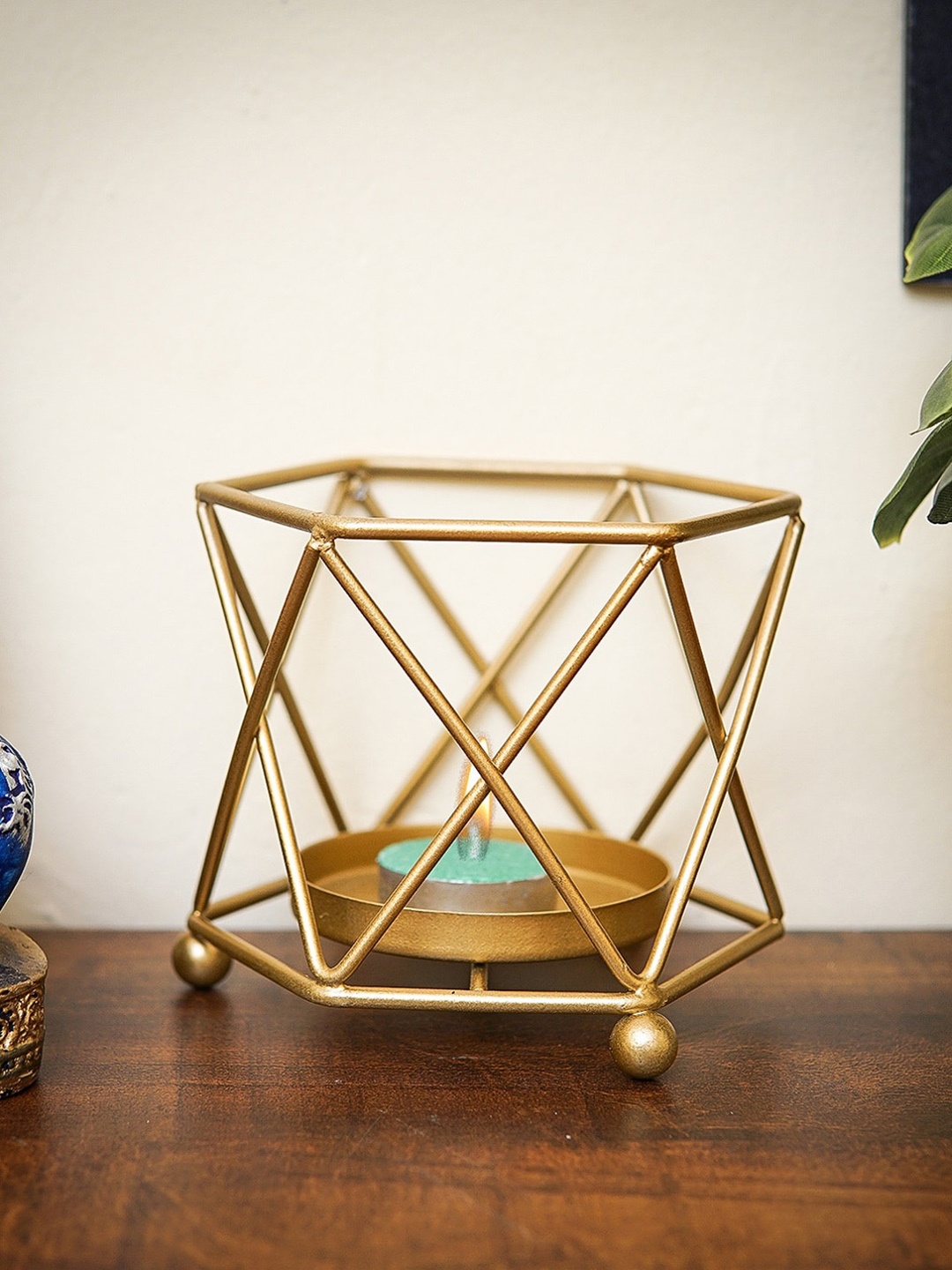 

StatueStudio Gold-Toned Solid Candle Holders