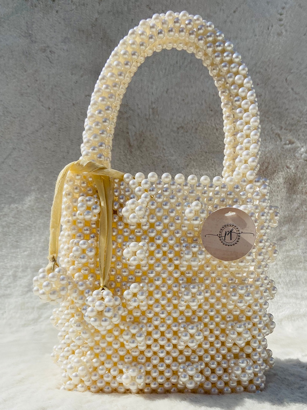 

Pearlfiesta Cream-Coloured Beaded Handheld Bag