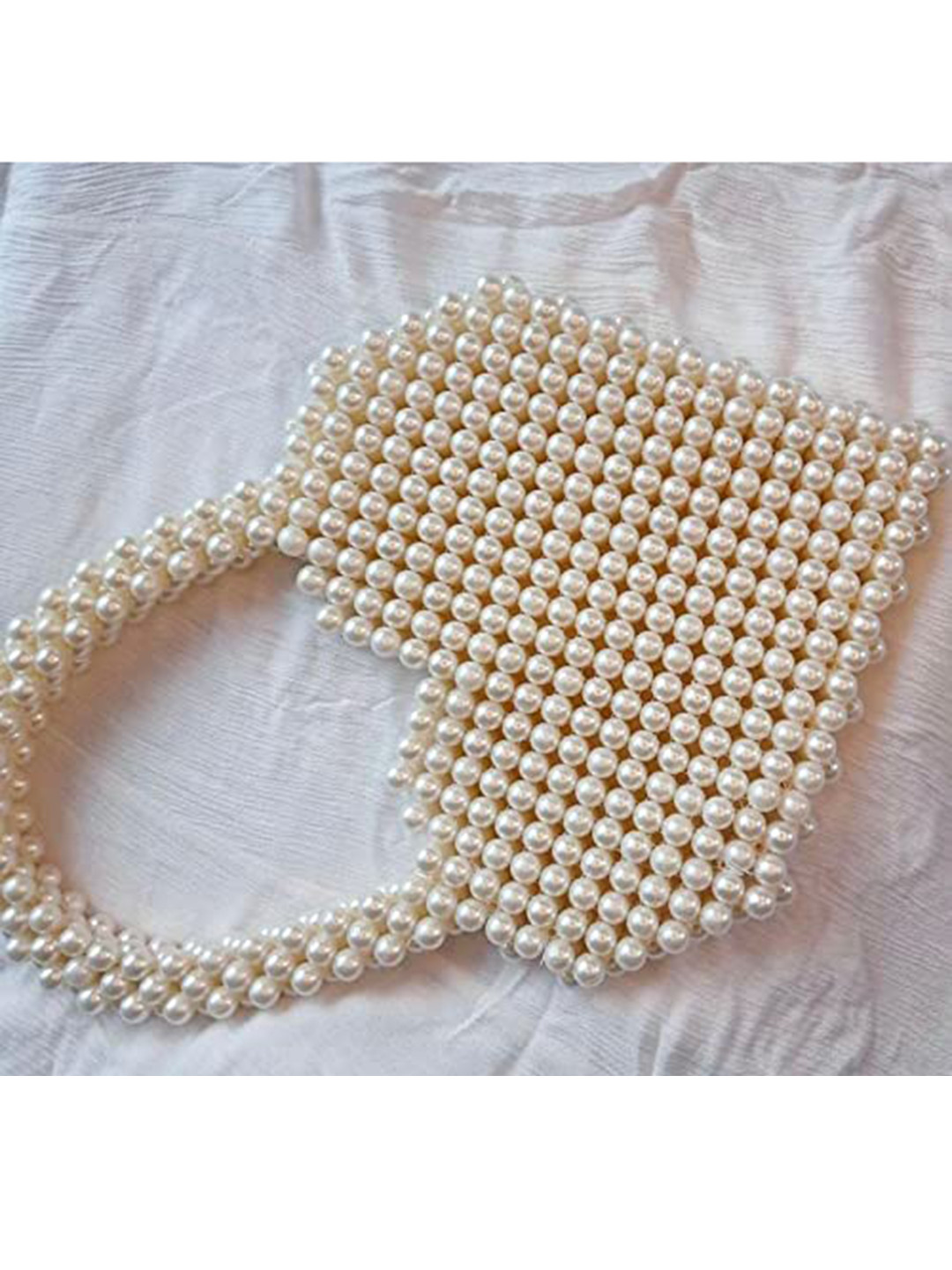 

Pearlfiesta Cream-Coloured Swagger Handheld Bag