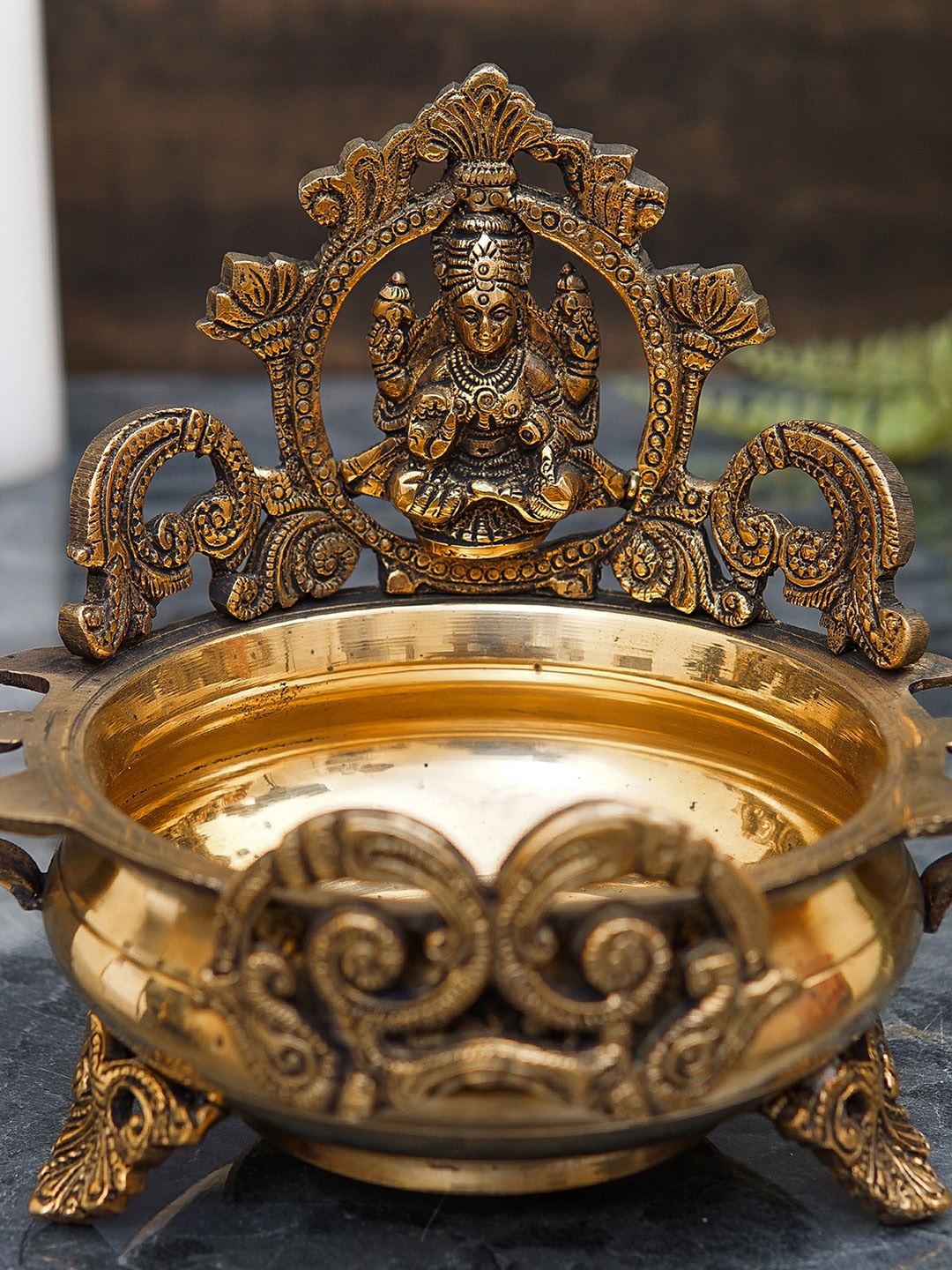 

StatueStudio Gold-Toned Lakshmi Urli Bowl Showpiece