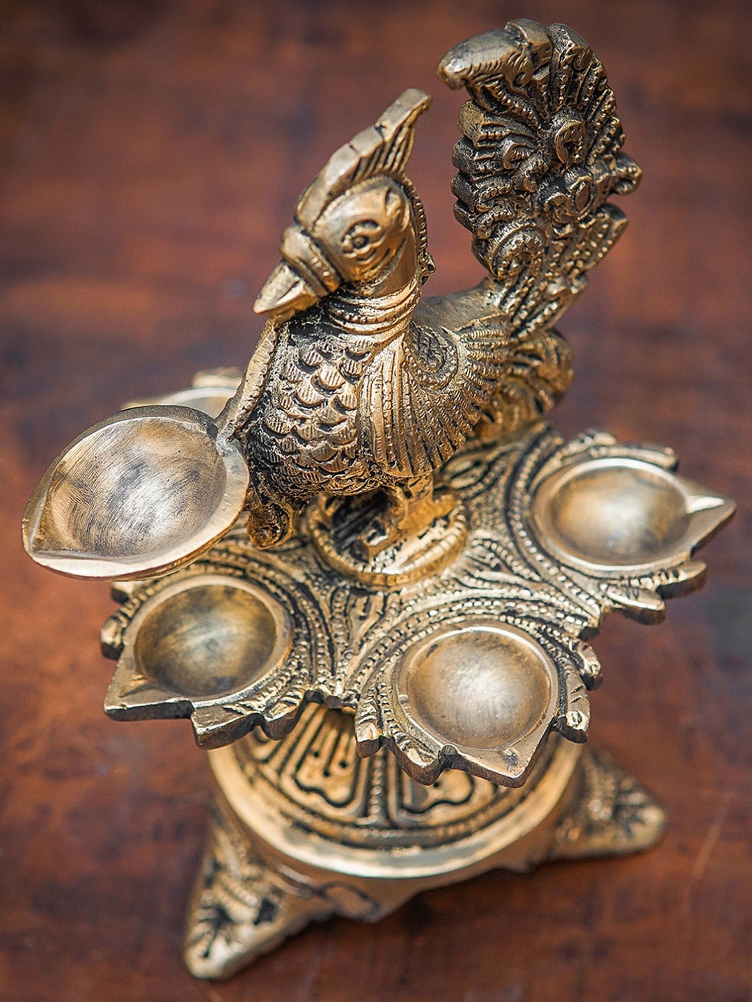 

StatueStudio Gold-Toned Peacock Bird Diya