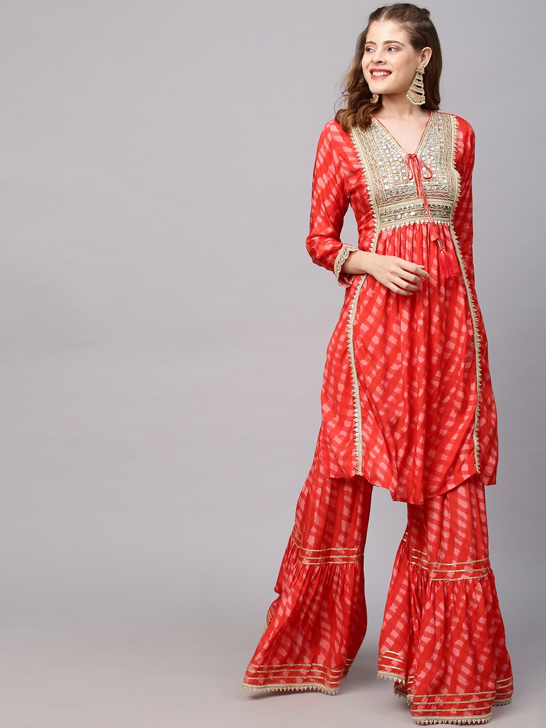 

Envy Me by FASHOR Women Red Embroidered Layered Gotta Patti Kurti with Churidar & With Dupatta