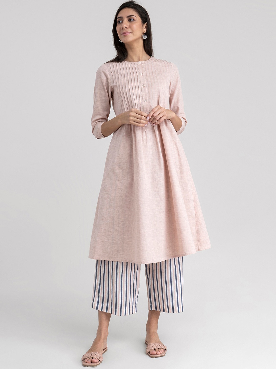 

Pink Fort Women Pink Yoke Design Layered Pure Cotton Kurti with Palazzos