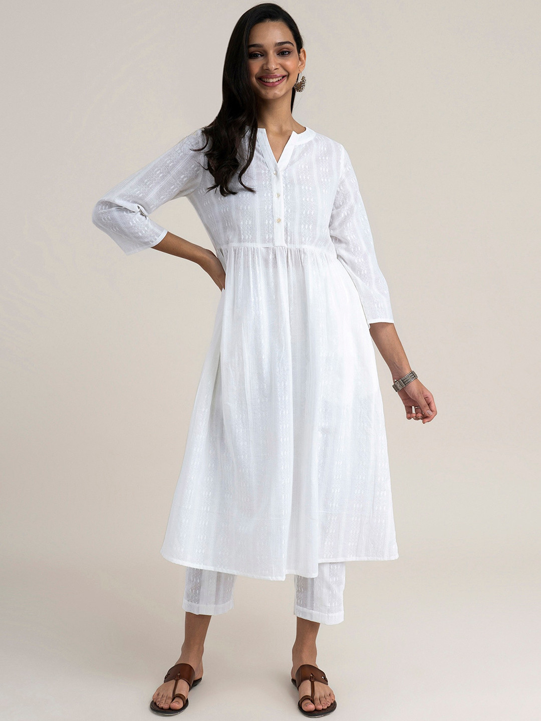 

Pink Fort Women White Yoke Design Pleated Pure Cotton Kurti with Trousers