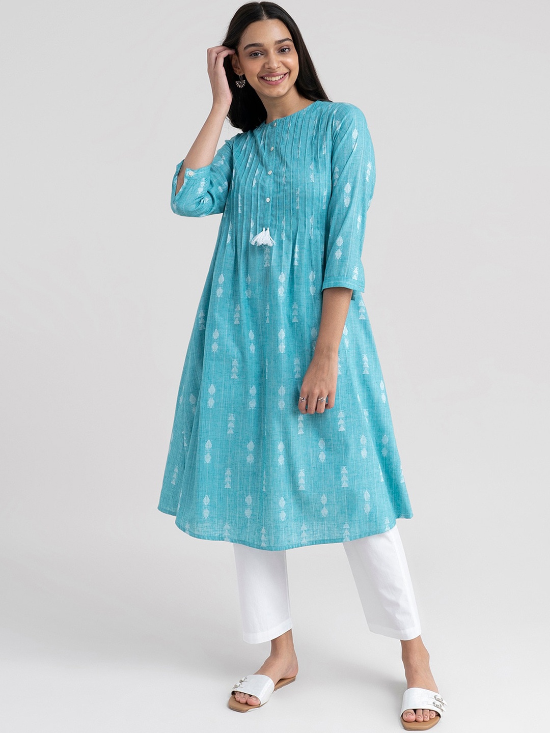 

Pink Fort Women Teal Ethnic Motifs Printed Pleated Kurta with Trousers