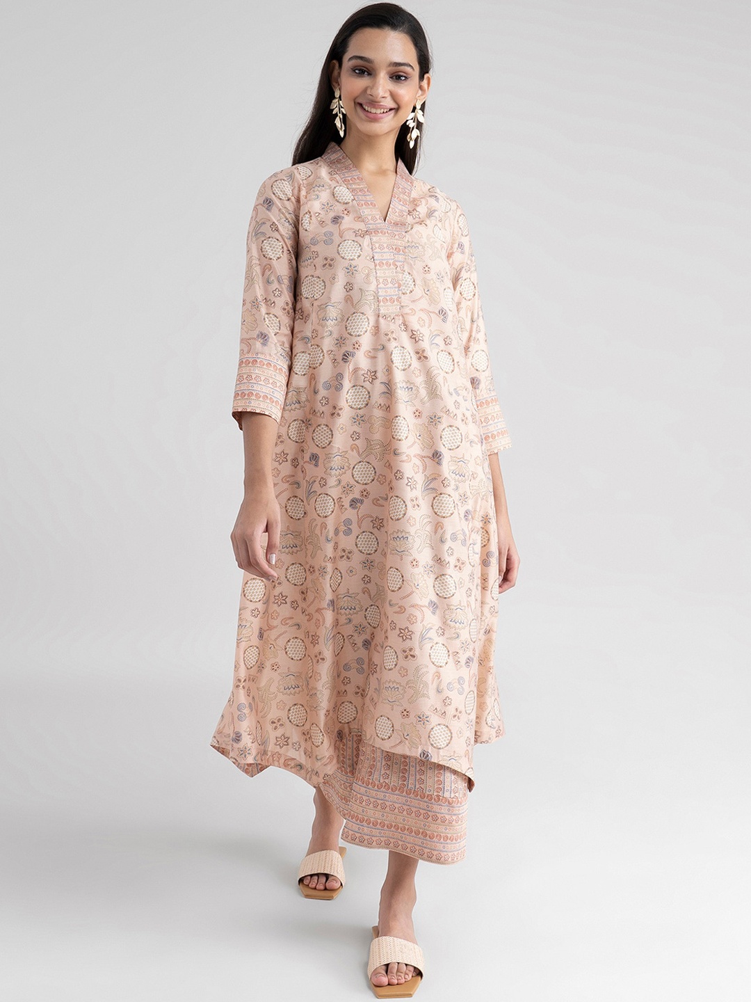 

Pink Fort Women Peach-Coloured Ethnic Motifs Printed Kurti with Palazzos & With Dupatta