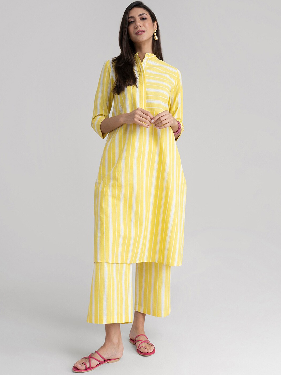 

Pink Fort Women Yellow Striped Panelled Pure Cotton Kurti with Trousers