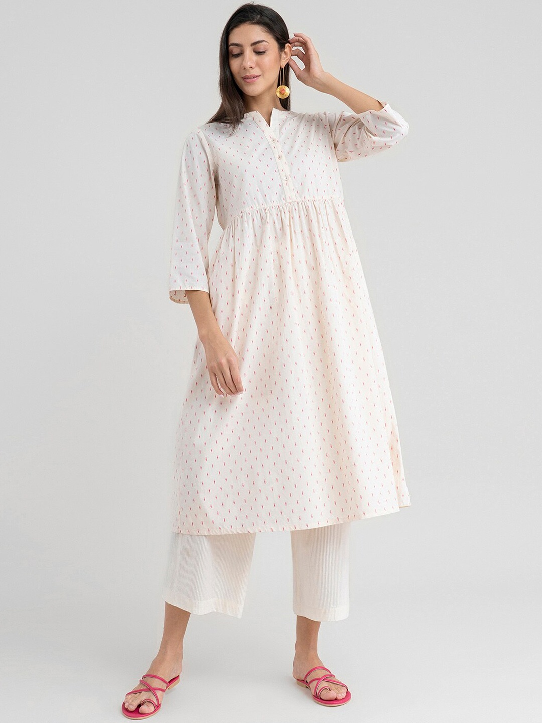 

Pink Fort Women Cream-Coloured Keyhole Neck Flared Sleeves Thread Work Dobby Anarkali Kurta