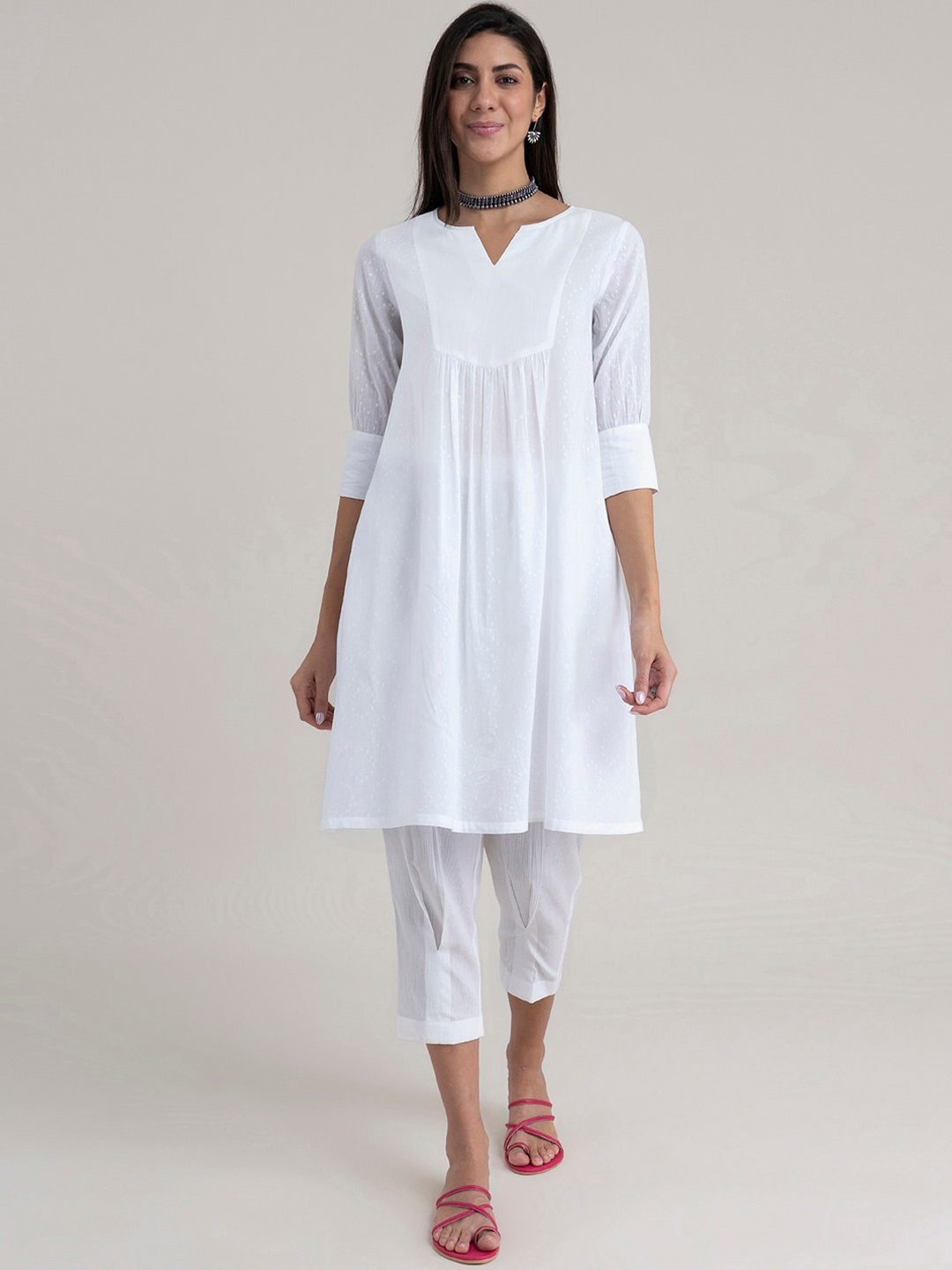 

Pink Fort Women White Pleated Pure Cotton Kurti with Trousers