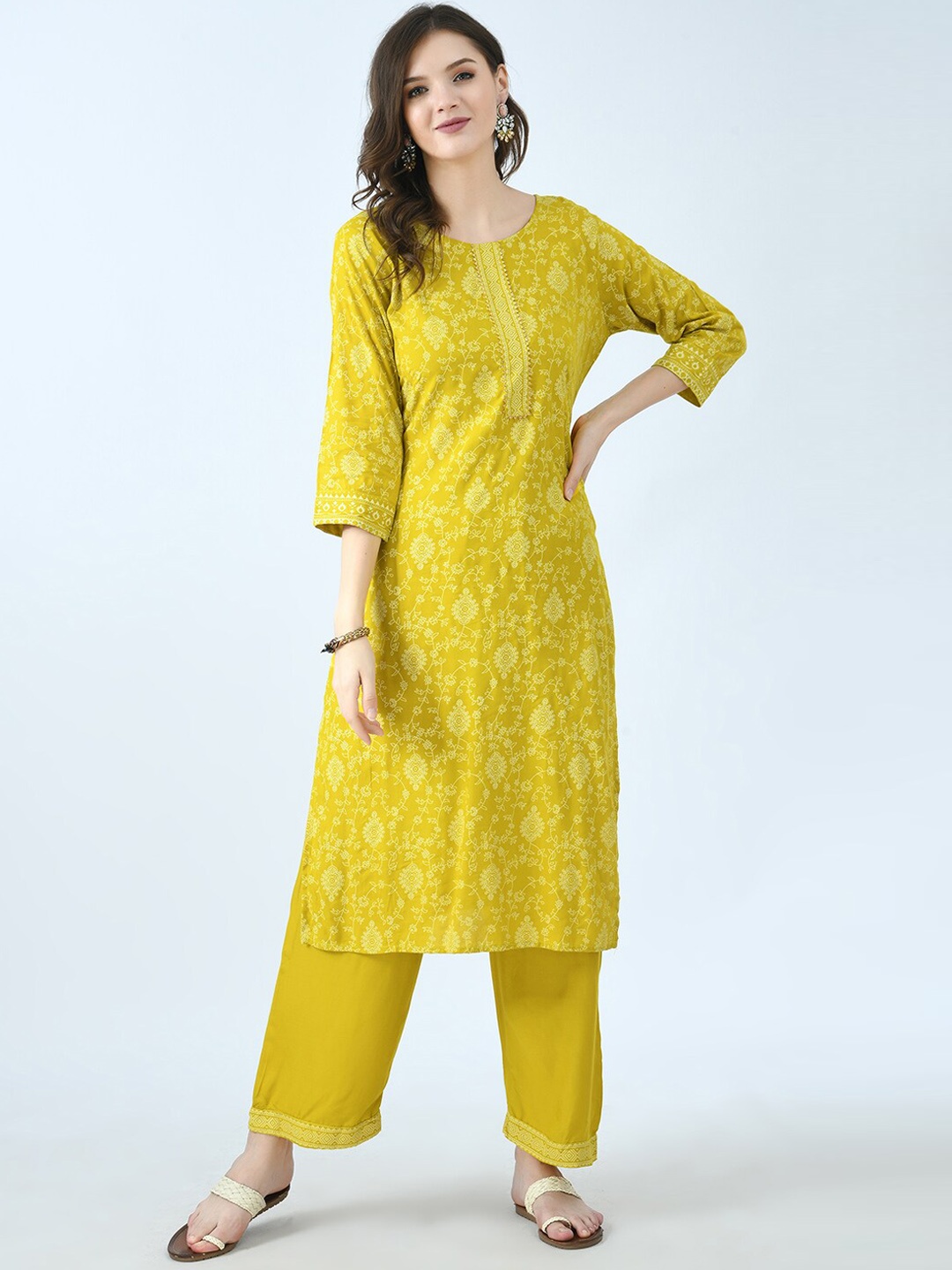 

KALINI Women Yellow Floral High Slit Kurti with Trousers