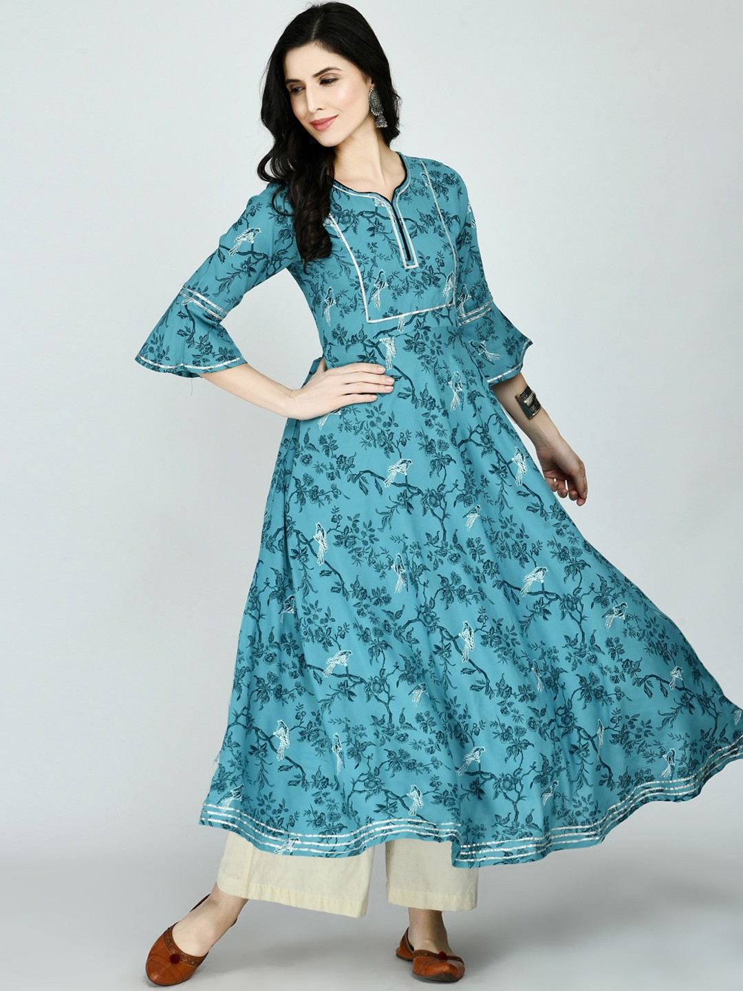 

KALINI Women Turquoise Blue Dyed Flared Sleeves Kurta