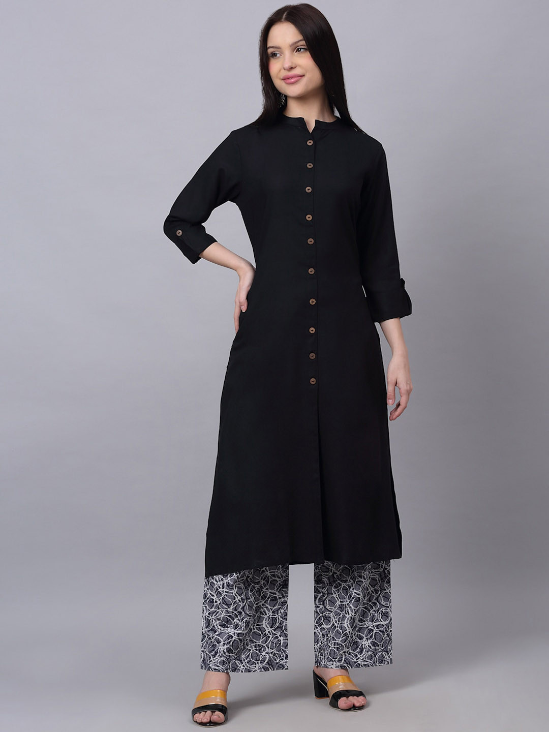 

DORIYA Women Black Panelled Kurti with Palazzos