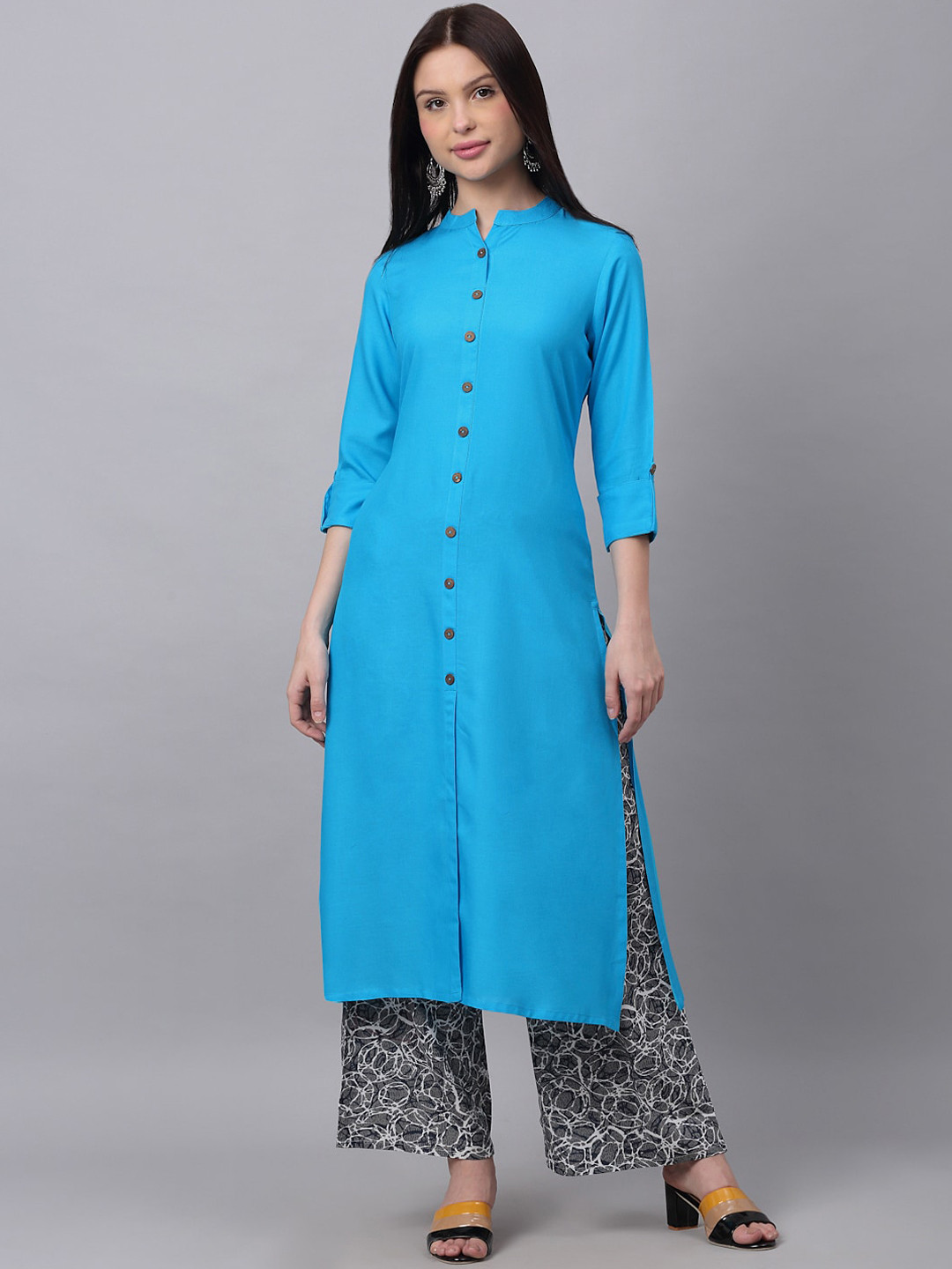 

DORIYA Women Turquoise Blue Floral Panelled Kurti with Palazzos