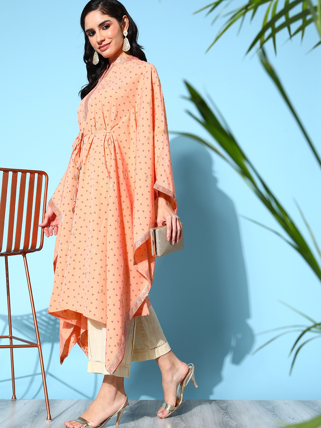 

Ahalyaa Women Peach Crepe New Age Kaftan Kurta