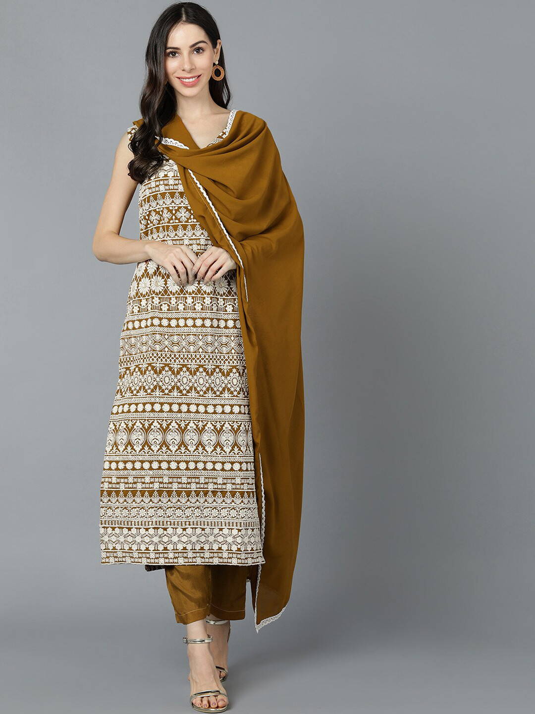 

AHIKA Women Mustard Yellow Printed Kurti with Trousers