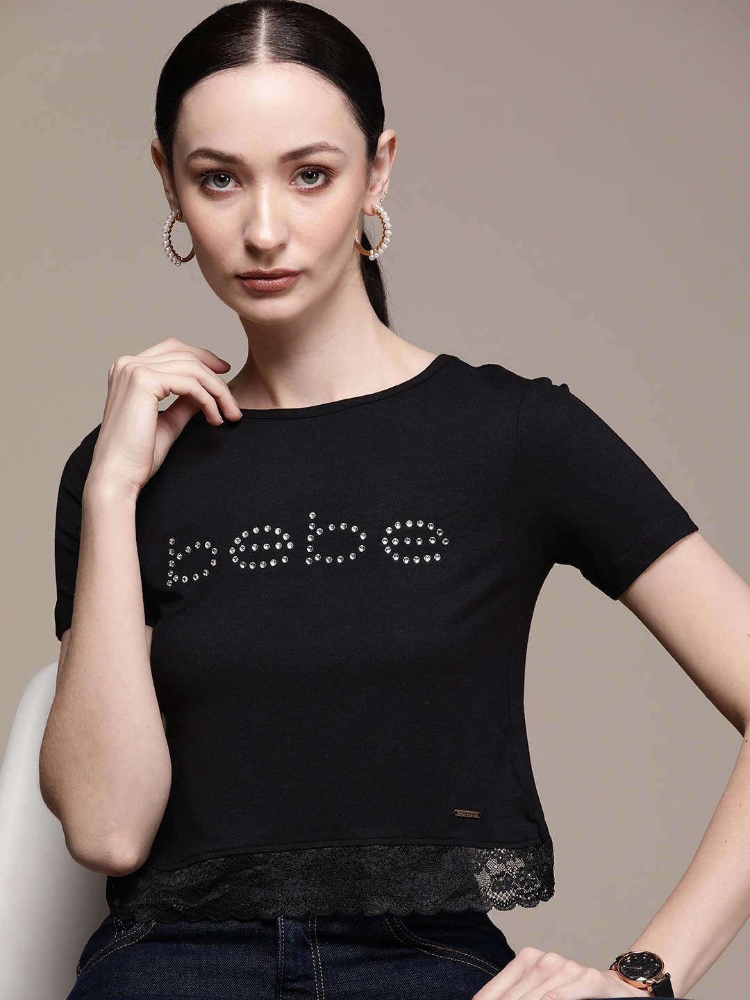 

bebe Women Jet Black Season Staple Brand Logo Embellished Lace Inserts Styled Back Top