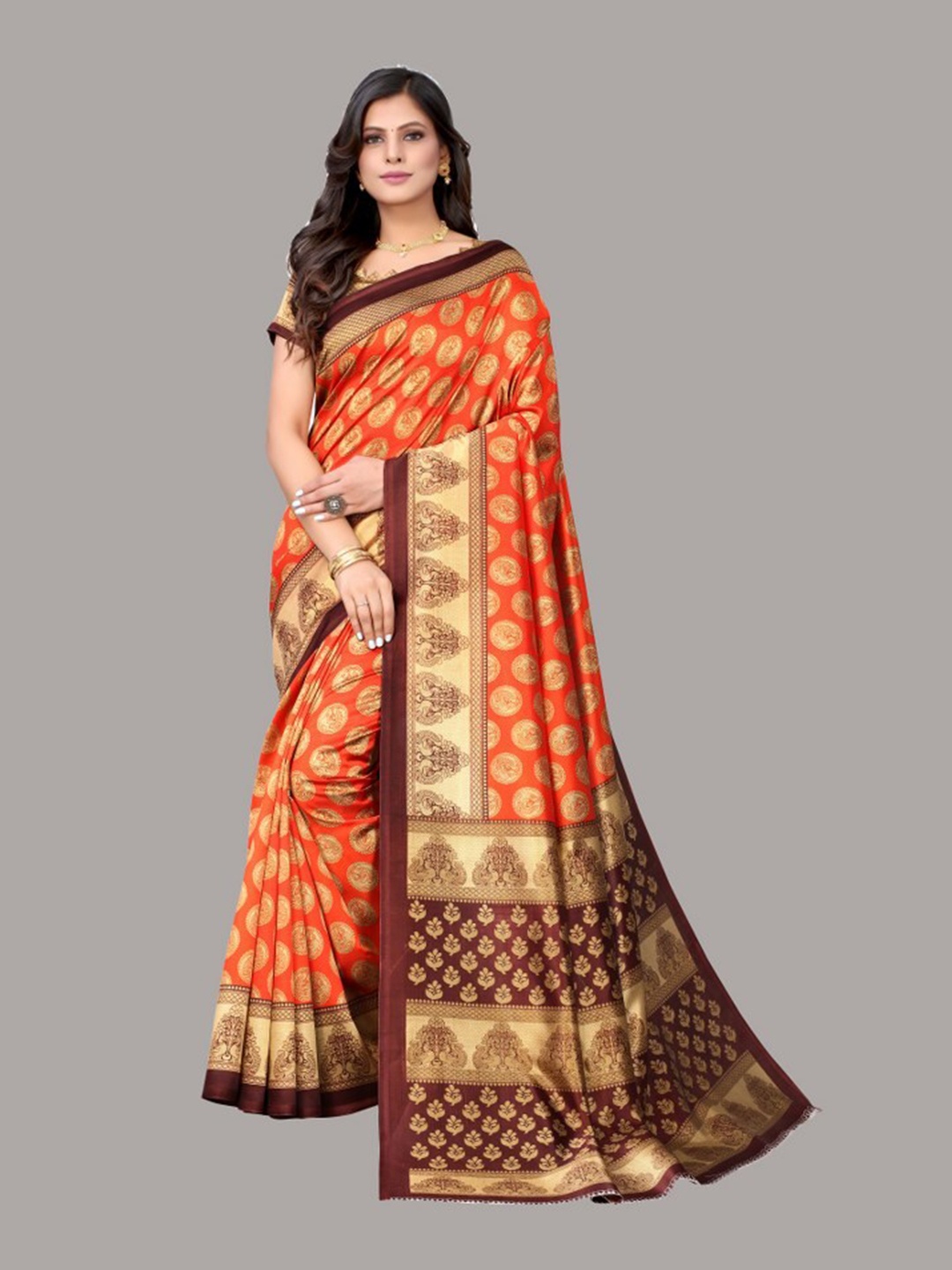 

Yashika Orange & Beige Ethnic Motifs Art Silk Saree