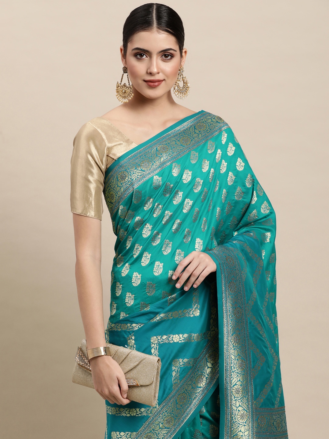 

MOHEY Turquoise Blue & Golden Ethnic Motifs Woven Design Saree