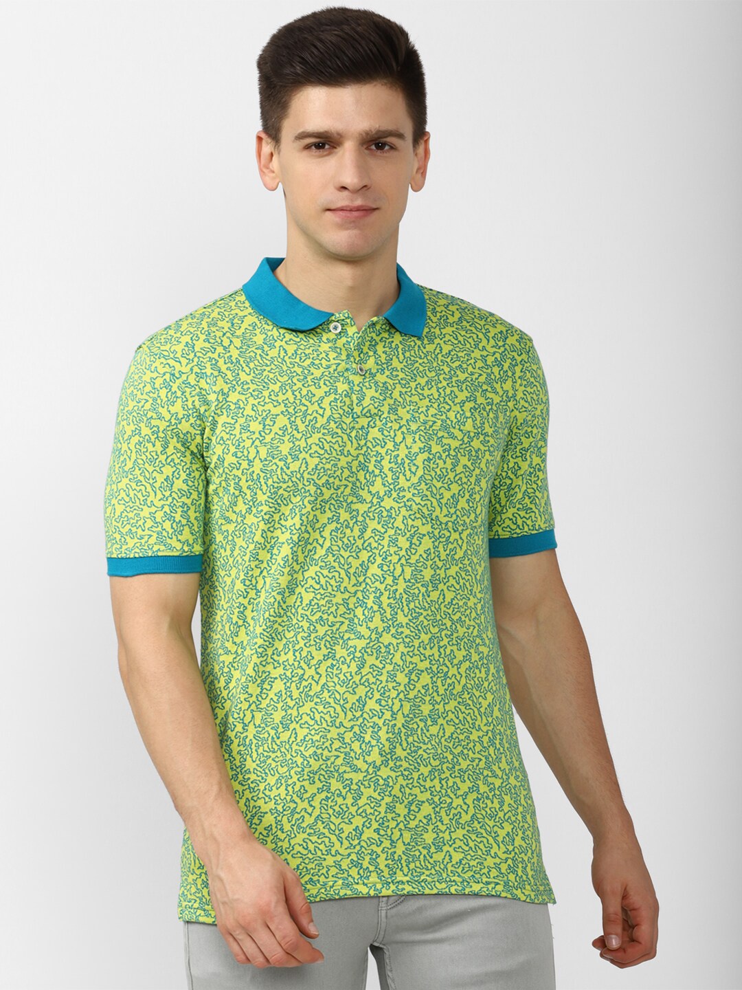 

Peter England Casuals Men Green Floral Polo Collar Tropical T-shirt