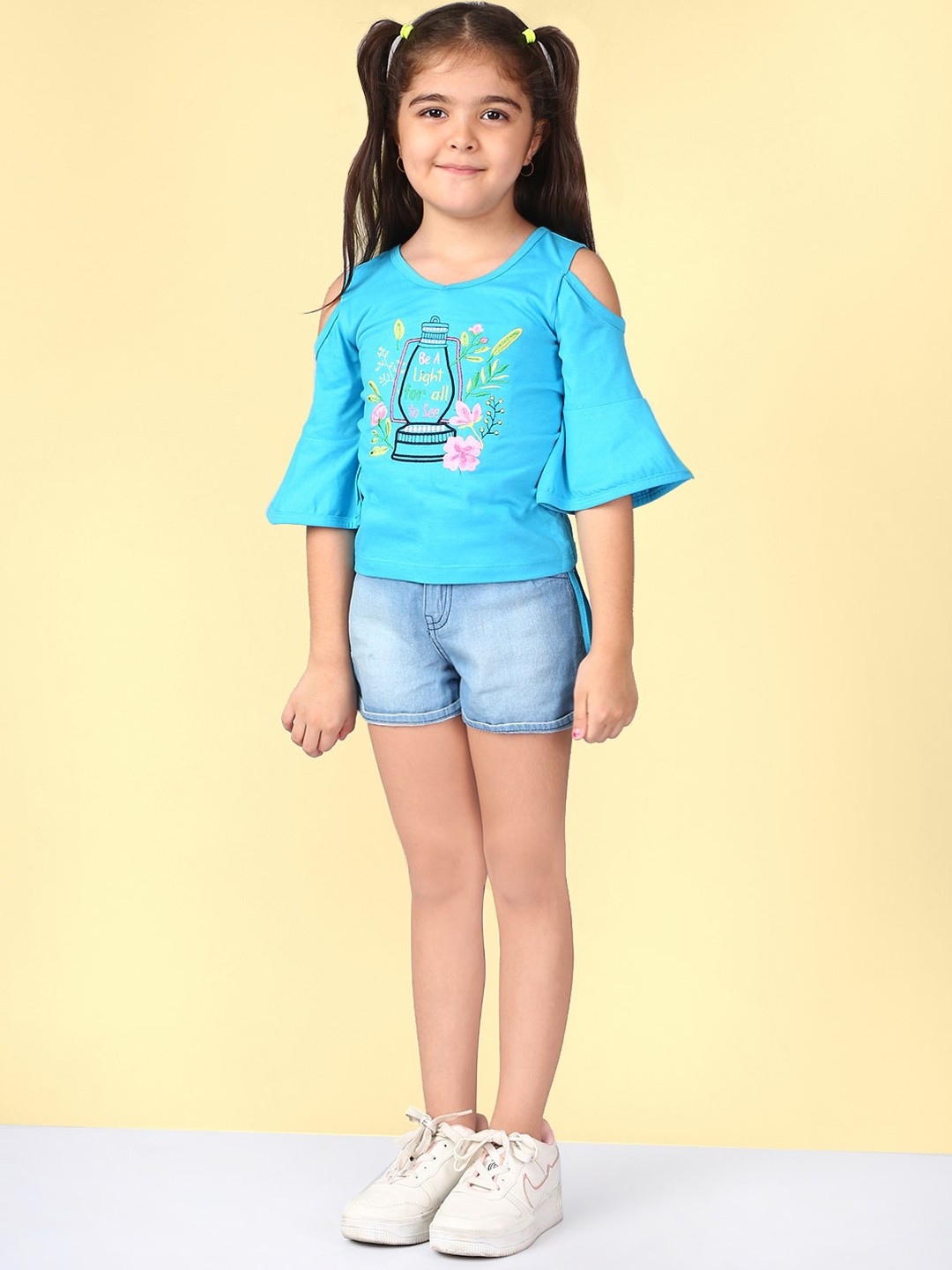 

Naughty Ninos Girls Turquoise Blue & Pink Printed Top with Shorts