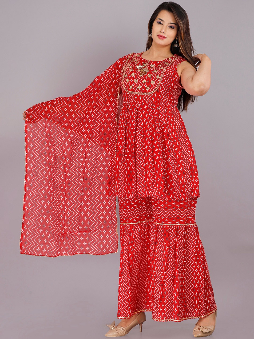 

PINGAKSH Women Yellow Printed Panelled Kurti with Sharara & With Dupatta