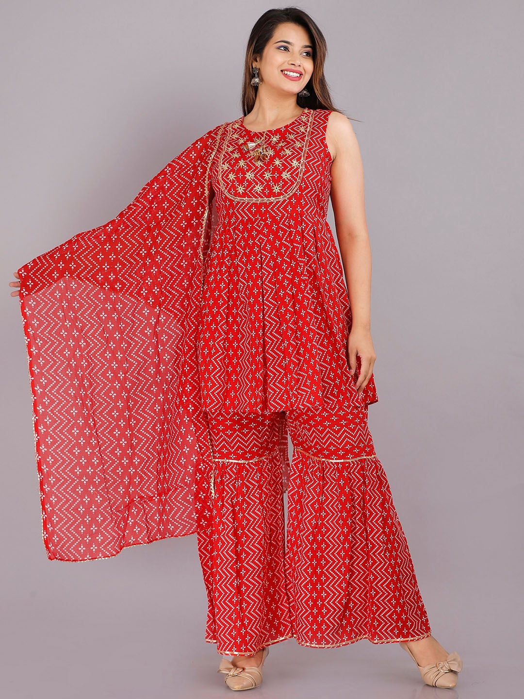

PINGAKSH Women Yellow Printed Kurti with Sharara & With Dupatta