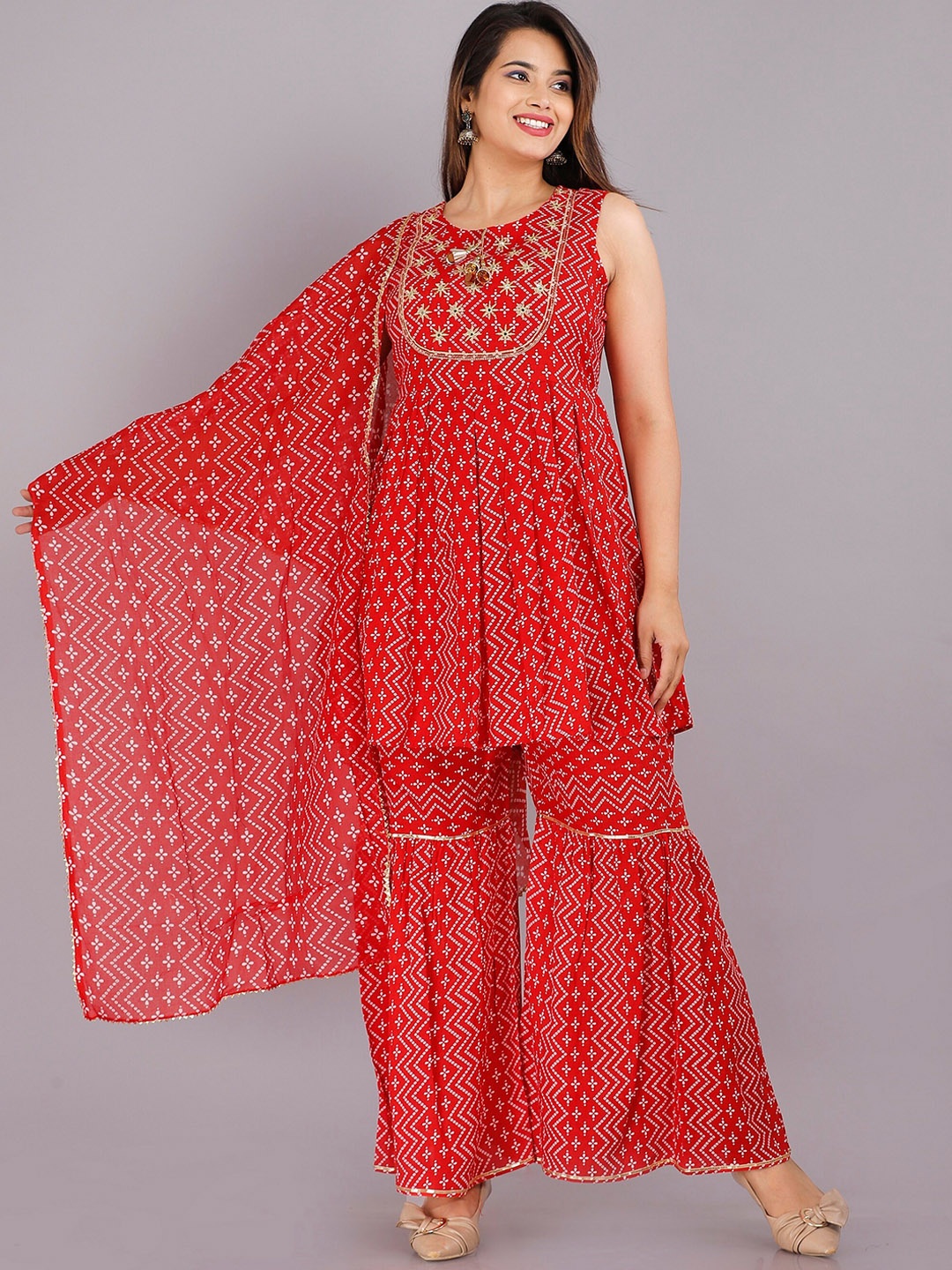 

PINGAKSH Women Yellow Printed Kurti with Sharara & With Dupatta